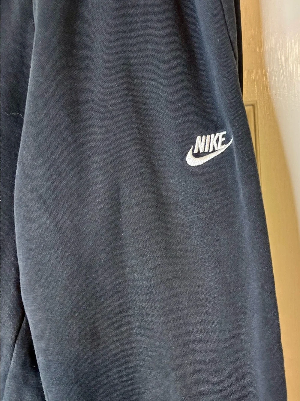 Nike Kids Black Jogger Sweatpants with White Swoosh